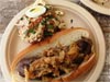 Bratwurst Cooked in Beer with Smothered Cabbage